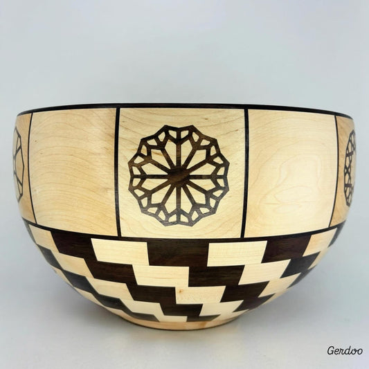 Wooden bowl with geometric patterns on a light gray background